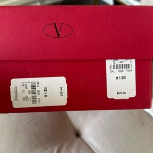 Valentino 38 1/2 Orig. $675 has 1 scuff mark on heel . No returns or exchanges